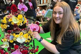 A team of florists from CAFRE competed in a student competition at the prestigious Interflora World Cup. Grace Thompson, Carly Gilmore and Kathleen McClorey showcased their skills at the Manchester Central Exhibition Complex, creating a floral design themed on ‘Our Natural World’ picking up third place in the competition.
