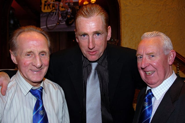 Sean Kelly,  former world champion cyclist with RT Autoparts East Tyrone CC President Geordie Wilson and longest serving member Jim Slane at the club's 60th anniversary presentation dinner back in 2007.