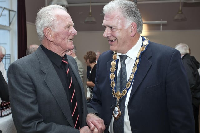 Bill Kennedy meets Harry Gregg at the Milk Cup Reception in 2010