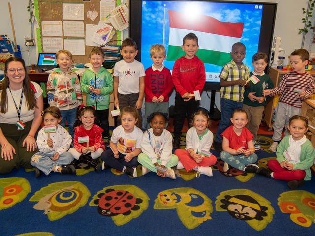P1 teacher Lauren Magowan pictured with her pupils who represented Hungary on Culture Day.