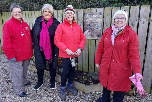 Members of the Inner Wheel planting 100 daffodil bulbs. From left, Norma Shannon, past district chair; Linda Hunter,  club secretary; Mary Carmichael, president and Jackie Tennant, member.  Photo provided by Larne Inner Wheel Club