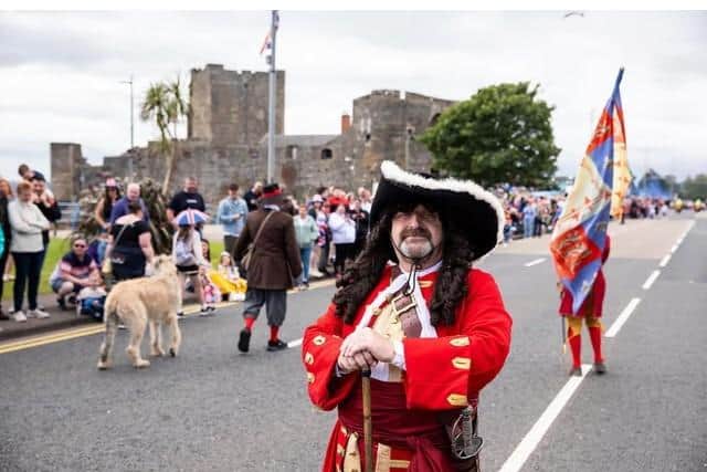 King William III pauses for a photo during Twelfth of July celebrations in Carrickfergus in 2024 for the East Antrim Combine. Photo: Graham Baalham-Curry