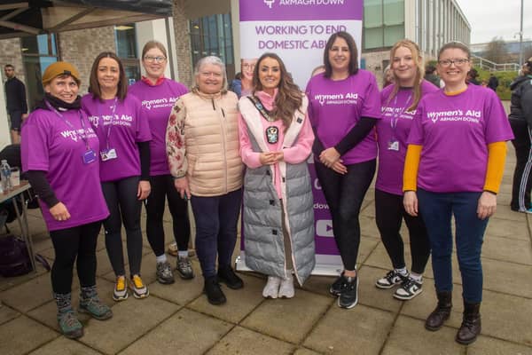 Mayor of ABC Council, Councillor Sarah Duffy pictured with staff of Women's Aid. LM08-225.