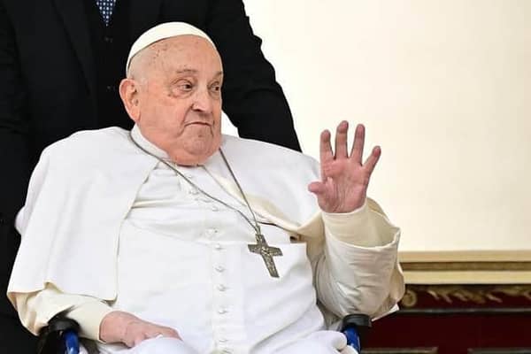 Pope Francis greets the crowd during a surprise appearance at the end of the mass for Palm Sunday at St Peter's Square in the Vatican on April 13, 2025. Picture: Tiziana FABI / AFP via Getty Images