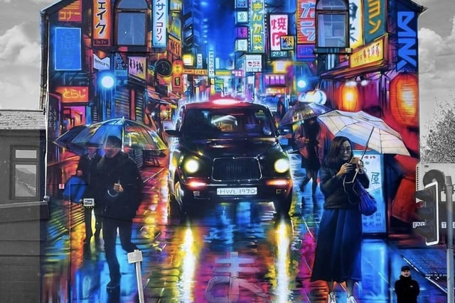 Known for his Japanese-inspired musings, Kitchener’s street murals transport you straight to Tokyo with their bright colours and immense detail.

You’ll struggle to miss these vivid art pieces, with them appearing all over Belfast, including Night Taxi on the Shankill.