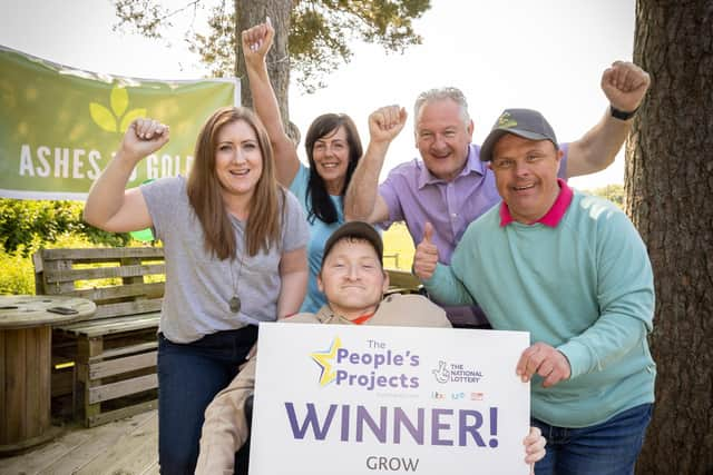 Rachel Skinner from The National Lottery Community Fund with people from Ashes to Gold, one of the winners of The People’s Projects.