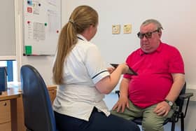 Patient James Robinson has praised the care he continues to received from the Ulster Hospital’s Orthoptic Team. James is pictured at one of his routine appointments with South Eastern Trust, Adult Lead Orthoptist, Katharine Hand. Pic credit: SEHSCT