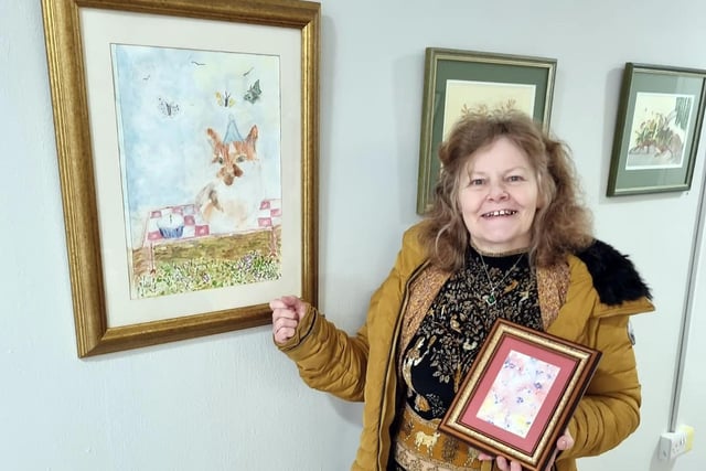 Trish Cully with her painting 'Meow - Lets Celebrate'.