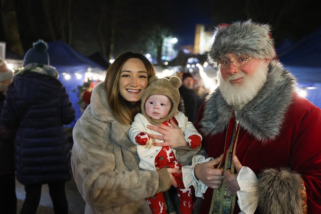 Kareen with baby Logan and Santa