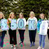 Dale Farm celebrates reaching £50,000 milestone for Cancer Focus NI.