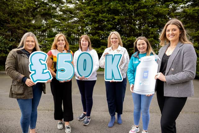 Dale Farm celebrates reaching £50,000 milestone for Cancer Focus NI.