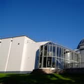 Armagh Planetarium is a planetarium located in Armagh, Northern Ireland close to the city centre and neighbouring Armagh Observatory in approximately fourteen acres of landscaped grounds known as the Armagh Astropark.