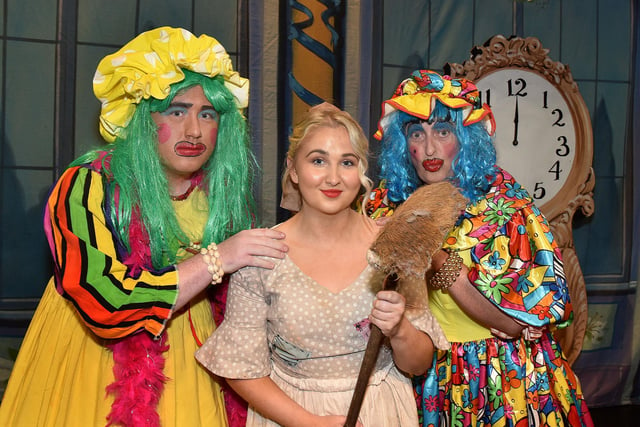 Jason Price, left, and Eddie Drury who play the 'Ugly Sisters' and Laura Clayton who plays Cinderella in the Gateway Theatre Group 40th anniversary pantomime. PT01-230.