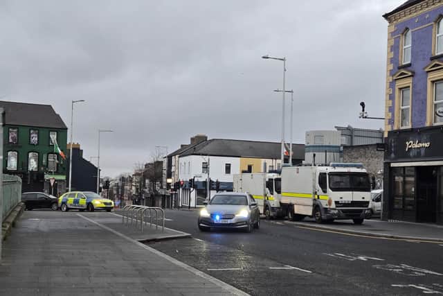 The scene outside Lurgan police station after delivery driver was ordered at gunpoint to drive with a briefcase-sized bomb to the station.