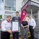 Mayor of Causeway Coast and Glens Councillor Ciarán McQuillan joins Harriet Hamilton and Robyn Rafferty, Visitor Services Advisors with Caroline Carey, Visitor Servicing Officer and Kerrie McGonigle, Destination Manager outside Ballycastle Visitor Information Centre to congratulate the team on being officially recognised for their service excellence with a Trip Advisor Travellers' Choice Award. CREDIT CAUSEWAY COAST AND GLENS COUNCIL