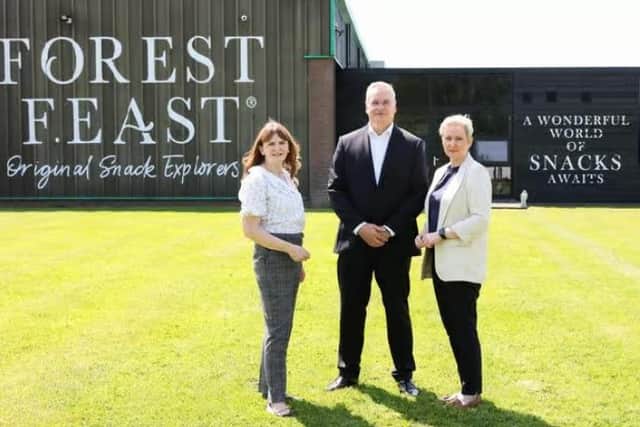 Invest NI provided support to Kestrel Foods to invest £5m in the growth of its Forest Feast brand in Portadown through advanced chocolate coating and polishing technology and to create 38 new jobs with support from its Agri-Food Investment Initiative. Economy Minister Dr Caoimhe Archibald is pictured with Michael Hall, Kestrel Foods founder and Managing Director, and Grainné Moody, Director of Food and Drink, Invest NI. Picture: Darren Kidd / Press Eye