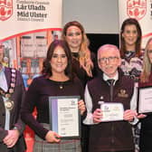 Pictured with the Chair of the Council, Councillor Dominic Molloy, Councillor Nuala McLernon and Councillor Eimear Carney are members of staff from the Hill of the O’Neill and Ranfurly House who received World Host Business Recognition awards.
