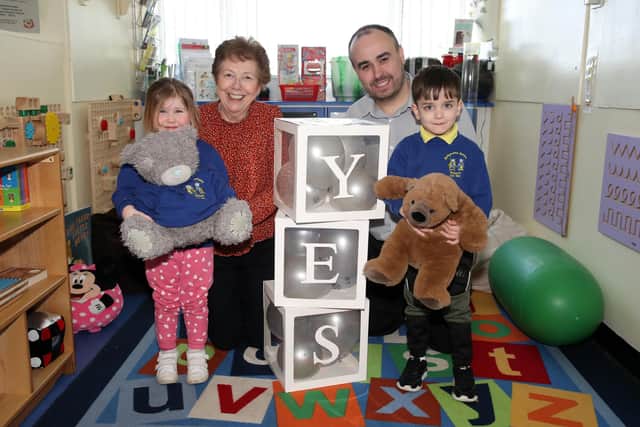 Principal Mrs Coulter, Andrew Norrie, Senior Outreach Officer at the IEF, and pupils from Ballymena Nursery celebrate parents voting yes to integrated education.
Picture: Declan Roughan