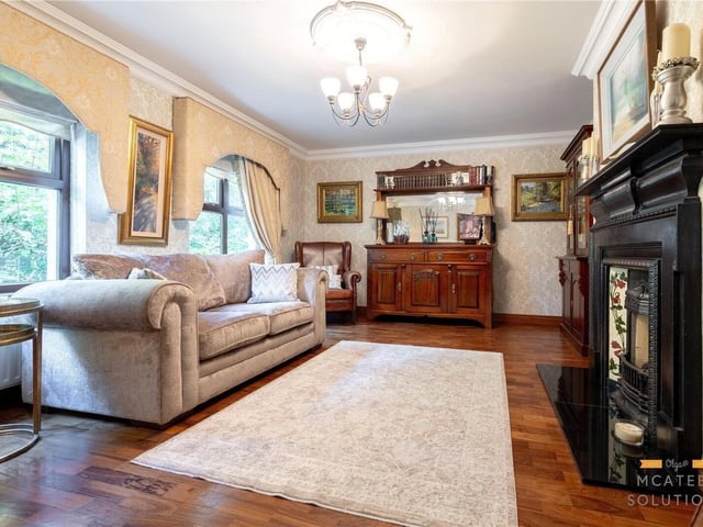 Reception room with solid wooden flooring, ceiling coving and gas fire complete with granite hearth and surround.
