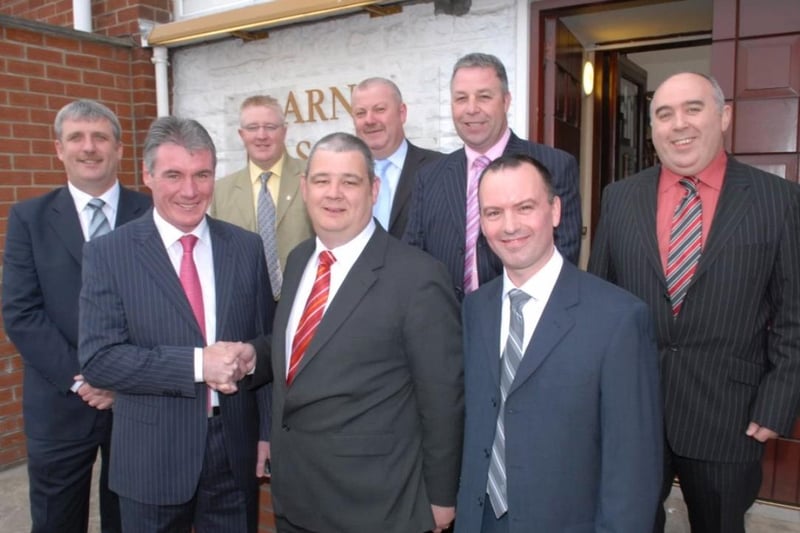 John Hylands welcomes chief guest former Manchester United and Ireland international Frank Stapleton to the Manchester United Supporters' Club dinner in the Larne Masonic Centre in 2008