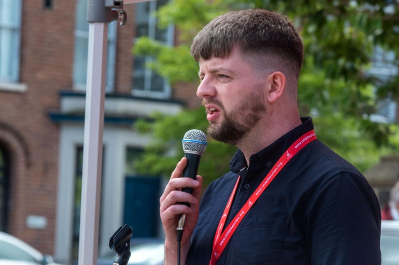 Unite regional officer Neil Moore speaking at Friday's rally. PT26-227.