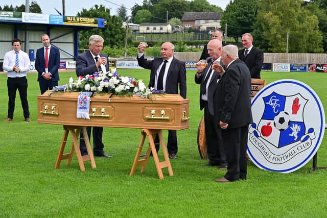 A toast to the memory of Hilbert Willis in the home of his beloved Loughgall Football Club. Picture: Arthur Allison / Pacemaker Press.