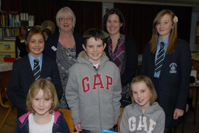 The Ferguson Family, Kate, Jack, Molly and mum Louise at the Dromore High School open evening in 2011 with pupils Emma Yalcinkaya, Stacey Simpson and maths teacher Mrs Eleanor Maguire.