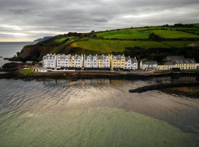 If you’re looking for a peaceful and quiet seaside visit, Cushendun is more quaint, with only a few guesthouses and restaurants to be found, giving a more authentic experience of an Irish seaside town. It’s also a great launchpad to visit the Game of Thrones sites on the north coast, with the Cushendun Caves being located here. Mary McBride’s Bar has one of the ten famous Game of Thrones doors that are hidden in pubs all over Northern Ireland, also providing a great spot to shelter from the cold.