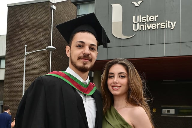 Masters degree Advanced general dental practice graduate Molham Selman pictured with partner Brazilian.