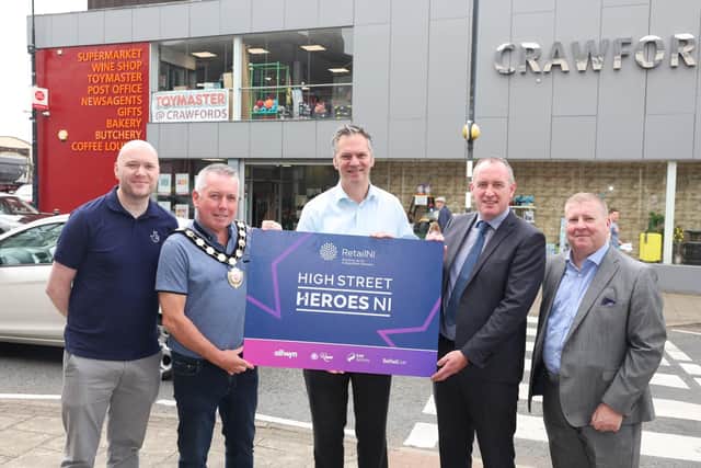Pictured, from left, are Declan Campbell, Allwyn, Eugene McConnell, Chair Mid Ulster Council, Jonathan Crawford, Retail NI, Cathal Mallaghan MP, Frank Shivers, Roam Local in Maghera. Credit: Submitted
