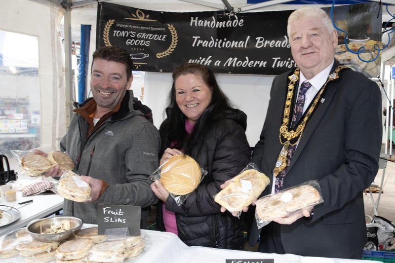 Tony and Kay from Tony’s Griddled Goods alongside Mayor, Councillor Steven Callaghan at Causeway Speciality Market, which has been named the UK’s Best Small Outdoor Market 2024.