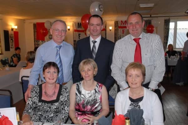 Beverley and Michael Gingles, Joan and Paul Graham and Shirley and James Hunter pictured at the Manchester United Supporters' Club dinner in the Larne Masonic Centre in 2008