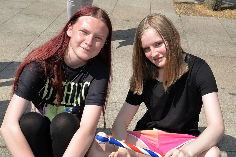 Sisters Mollie, left, and Madison Nelson wait for the parade to arrive in the town centre on Sunday afternoon. PT23-250.