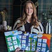 Kerri Thompson with her visual communication supports, Helpful Little Pictures