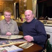 Neil Lennon's parents Gerald and Ulsula pictured in 2000 in their Lurgan home going through the scrapbooks thay collected on Neil's career. Picture: Pacemaker