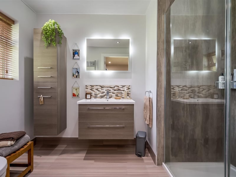 En-suite shower room with contemporary three piece suite.