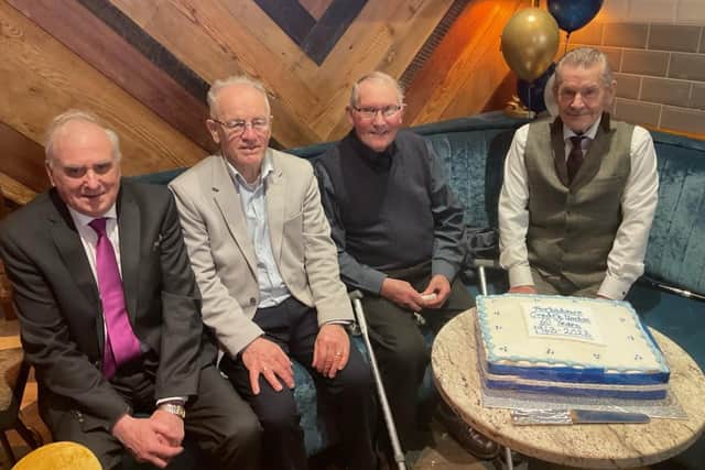 Attending the 60th anniversary of Portadown Credit Union are four of its original members, Denis McCourt,  Tom Hyde,  Joseph McConville and Aidan Hagan. These were the four remaining original members who set up the credit union in Portadown in 1963 and they were presented with a gift.