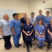 Front left:  Claire Gressani and back right: Chris Allam with the Endoscopy and Booking Teams. Pic credit: SEHSCT