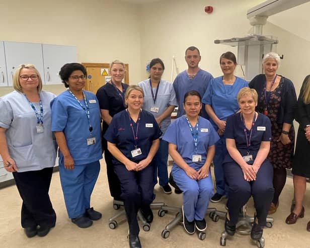 Front left:  Claire Gressani and back right: Chris Allam with the Endoscopy and Booking Teams. Pic credit: SEHSCT