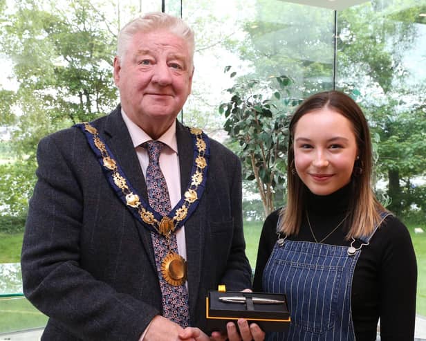 Mayor of Causeway Coast and Glens, Councillor Steven Callaghan pictured beside Dalriada student Lauren Bond, who has been recognised by the Mayor for her campaign and political work. Credit Causeway Coast and Glens Council