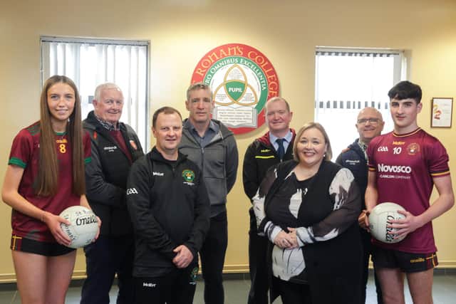 Pictured with St Ronan’s College students Evie McCaffery (left) and Tom Lavery (right) are, from left to right, Jimmy Smyth (President, Armagh GAA), Kevin Curran (GAA Participation Officer), Kieran McGeeney (Armagh GAA Football Manager), David Wilson (Head of Maths Department and Football Coach, St Ronan’s College), Fiona Kane (Principal, St Ronan’s College) and Sean McAlinden (Vice Chair, Armagh GAA).  Picture: Brian Thompson