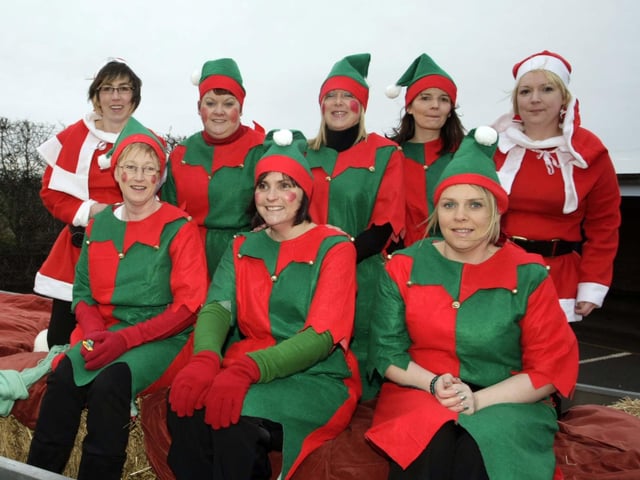 GR'EIGHT' ELVES. Pictured are Santa's helpers and elves, (aka PTA members and parents) who turned up at Lislagan PS in 2008