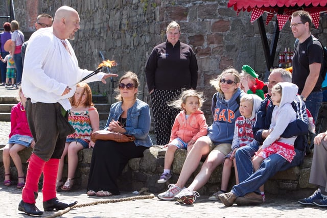 Entertaining the crowd at the Lughnasa Fair in 2013. INCT 31-428-RM