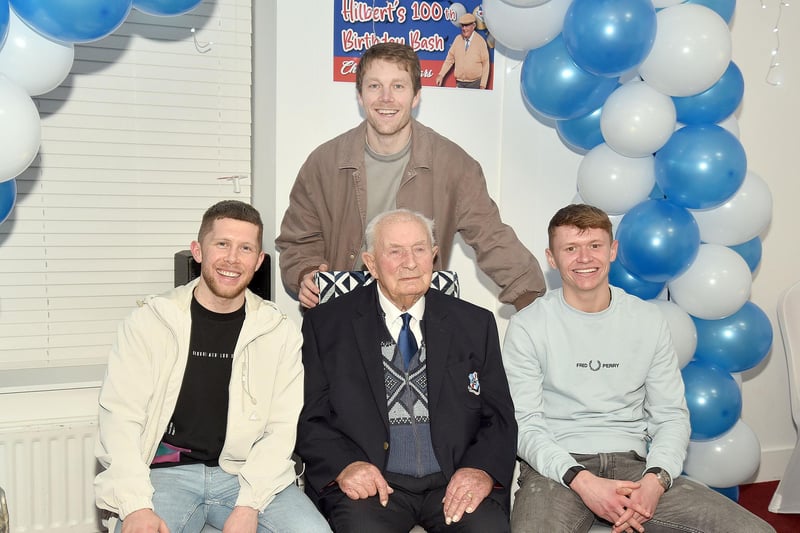 Hilbert Willis pictured at his 100th birthday party at Loughgall FC with current players from left, Jamie Rea, Ben Murdock and Luke Cartwright. PT07-212.