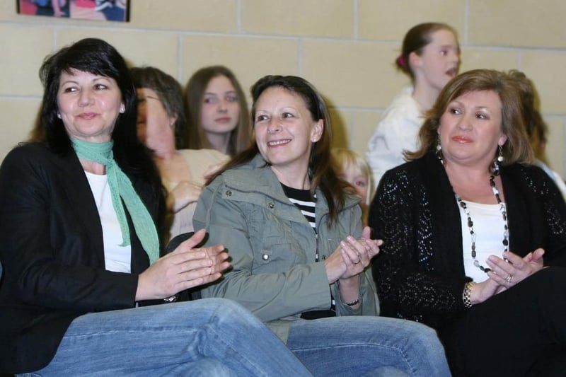 Audience members show their appreciation of the NORSUN fashion show in 2007.