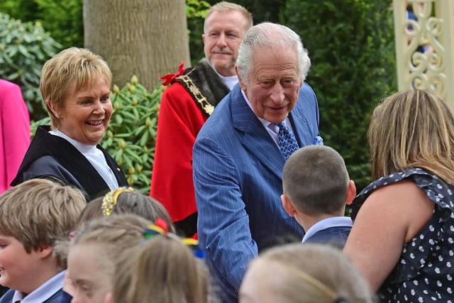 King Charles takes time for a walkabout during his visit to Hazelbank Park. Picture: Colm Lenaghan/Pacemaker