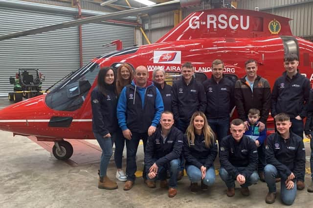 ​Family and friends of Cathal McCrory visited Air Ambulance NI’s operational base outside Lisburn last weekend, where they presented a cheque for £10,276 in his memory.