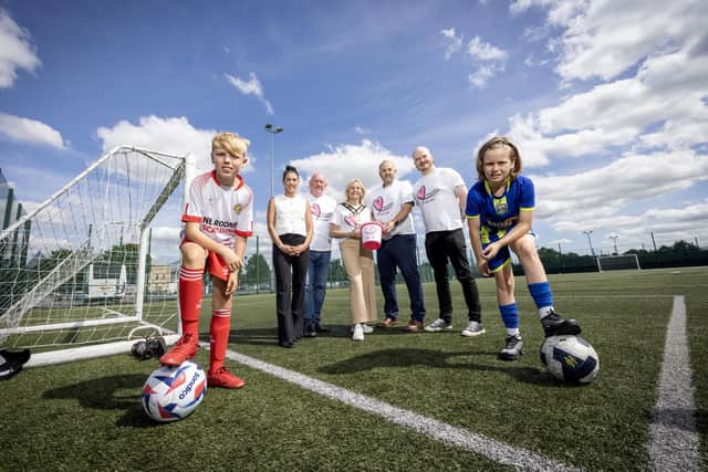 Pictured at the launch of the Mayors Cup was from left, Cyril Moorehead, Good Relations Officer and Courtney Scates, Area Manager at Choice Housing, Chris Budd, Lisburn, Castlereagh Junior League, Christopher Corbett, Corporate Fundraising Executive at Action Cancer, Mayor Amanda Grehan and Oliver McGrogan and Mylo Dobbs who are honing their football skills in advance of the tournament taking place on Saturday August 1 and Sunday August 2. Pic credit: LCCC