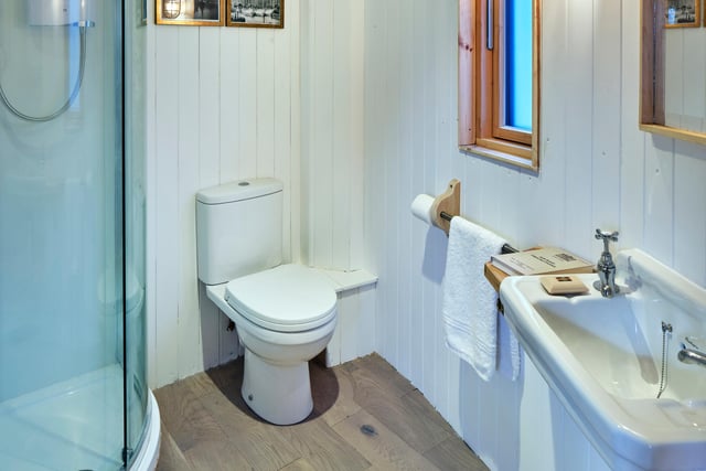 Freshen up in the curved, modern shower room, complete with plenty of piping hot water.