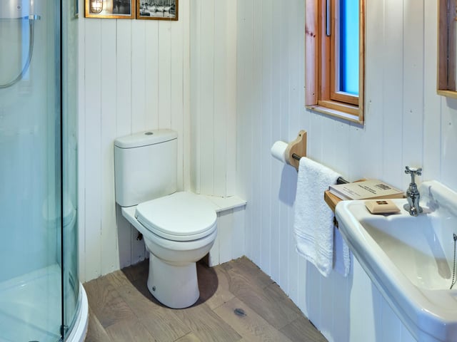 Freshen up in the curved, modern shower room, complete with plenty of piping hot water.